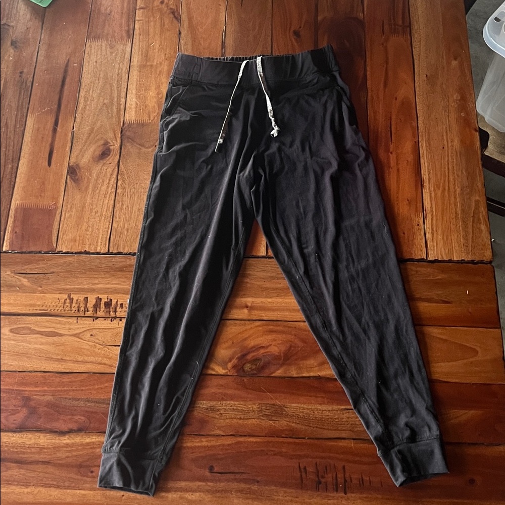 Mono B Black Jogger Pants with Orange Logo